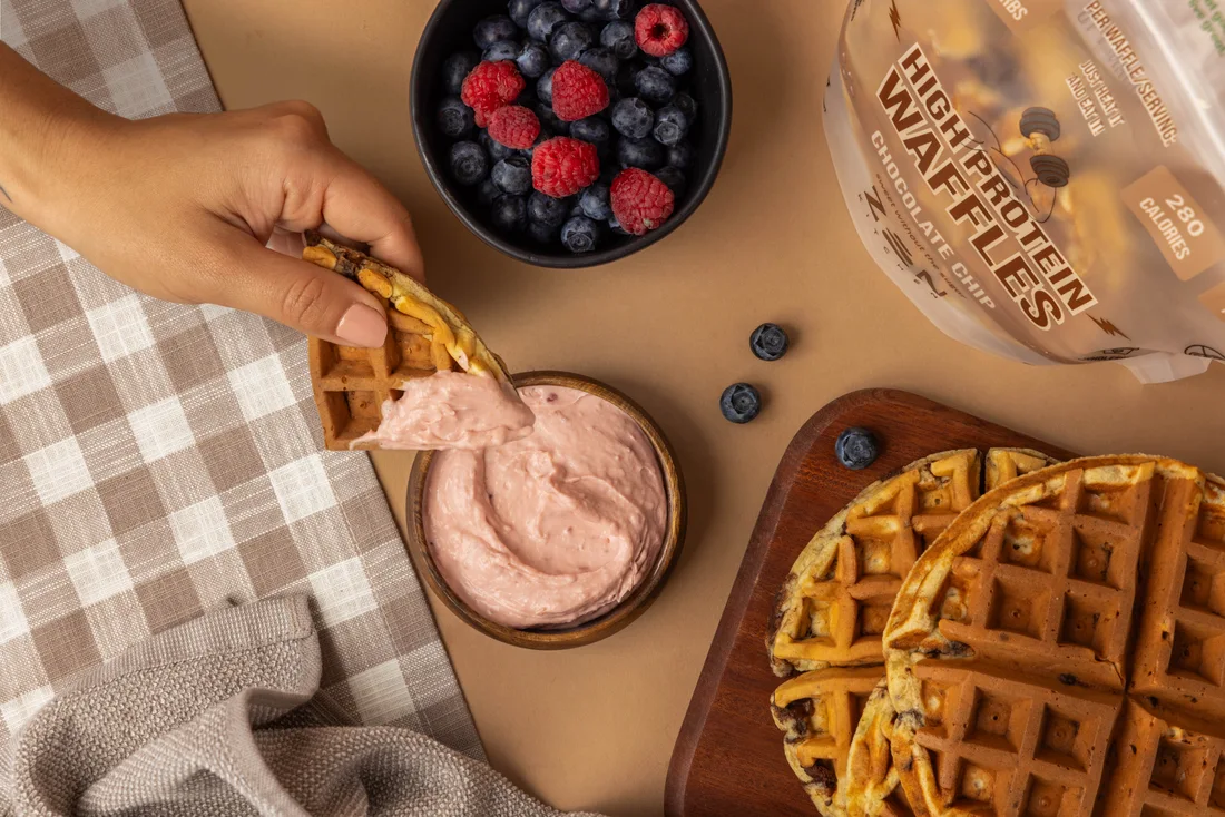 Chocolate Chip waffles styled with fresh fruit and a spread
